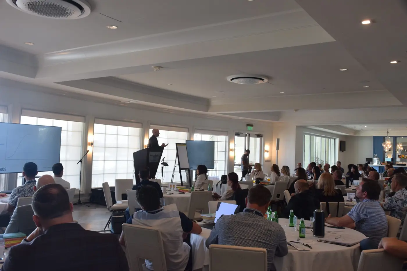 Andrew Hartman teaching the Time Boss framework on stage